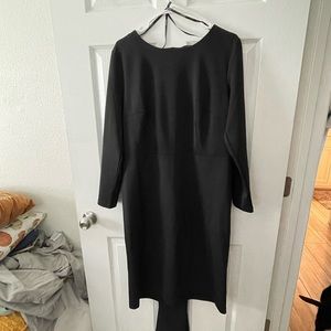 Black ELOQUII dress with bow.